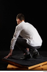 Whole Body Man White Shoes Shirt Trousers Slim Kneeling Studio photo references